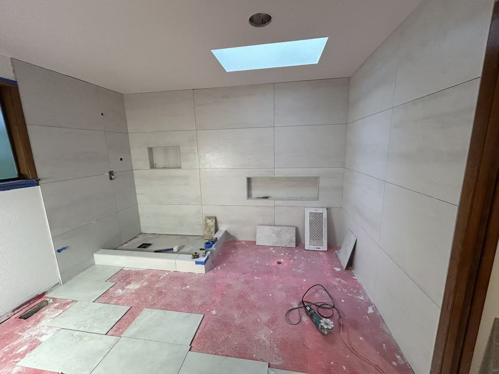 Bellevue spa bath stage 4 — mid-build framing and rough plumbing