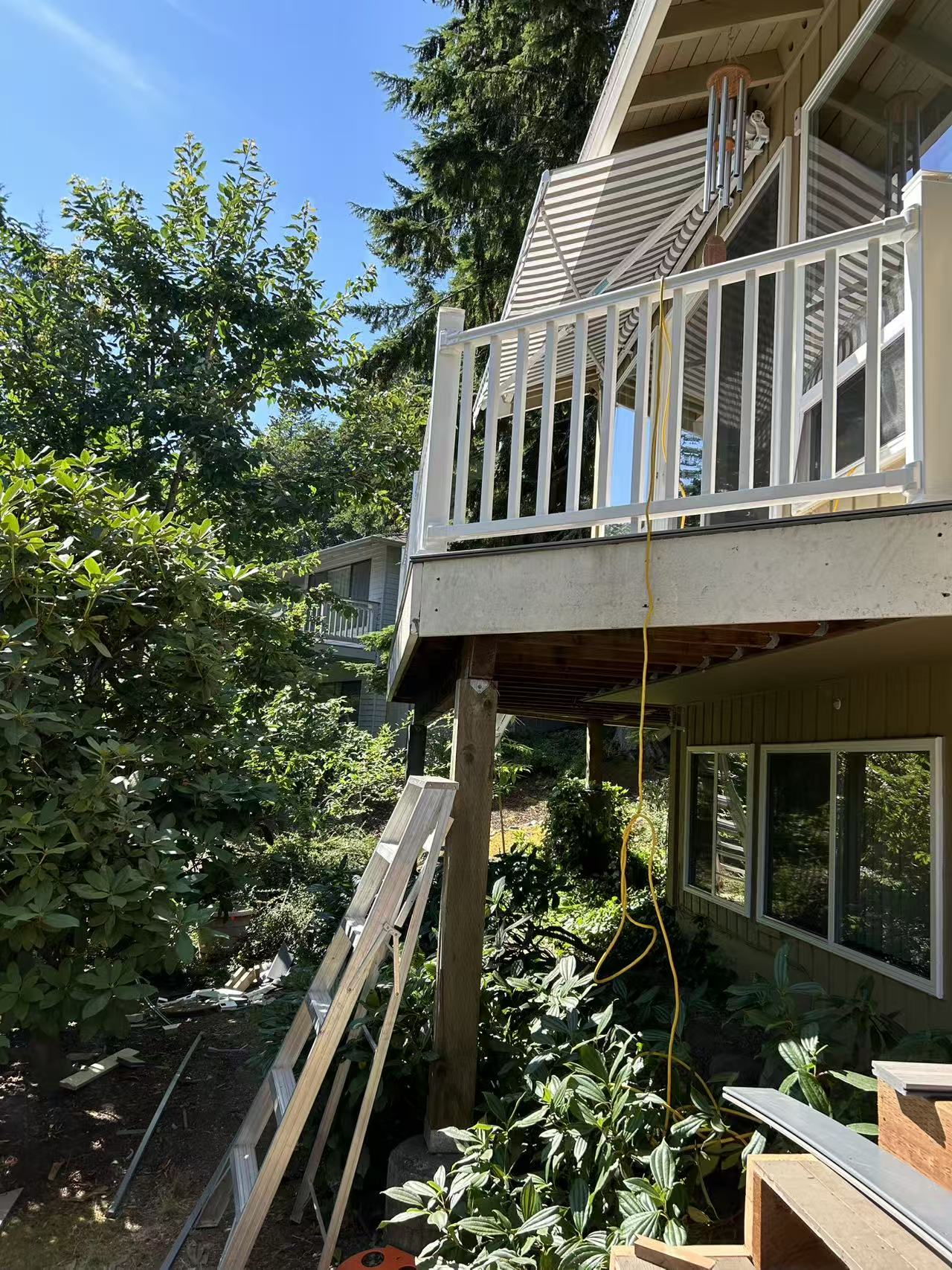 Bothell deck stage 7 — finished balcony detail and stair treads